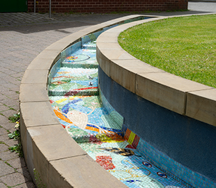 A mosaic of pond animal in a fountain