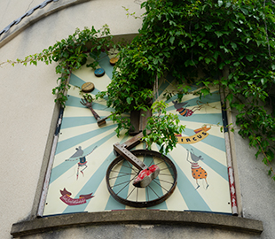 3D artwork of a juggling, unicycling robot