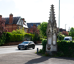 An ornate stone drinking fountain