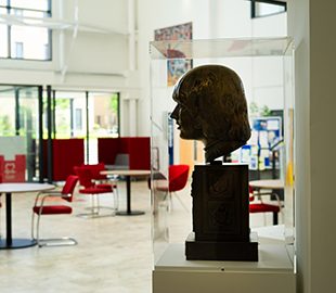 A golden bust of guitarist Brian Jones