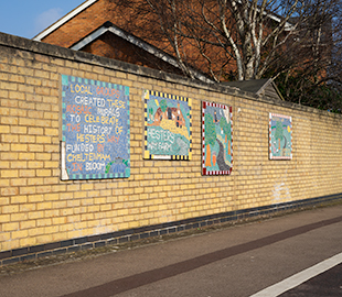 A series of colourful moasics in Hesters Way, Cheltenham