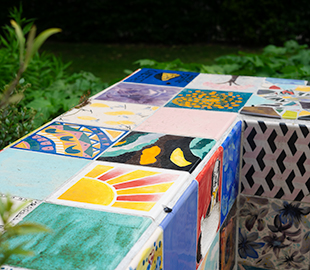 A colourful tiled bench in Cheltenham