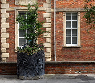 A large galvanised steel planter