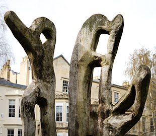 A chainsaw sculpture carved from a dying tree