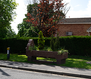 An old drinking trough being used as a planter