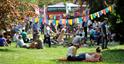 People enjoying the atmosphere in a park during a Festival